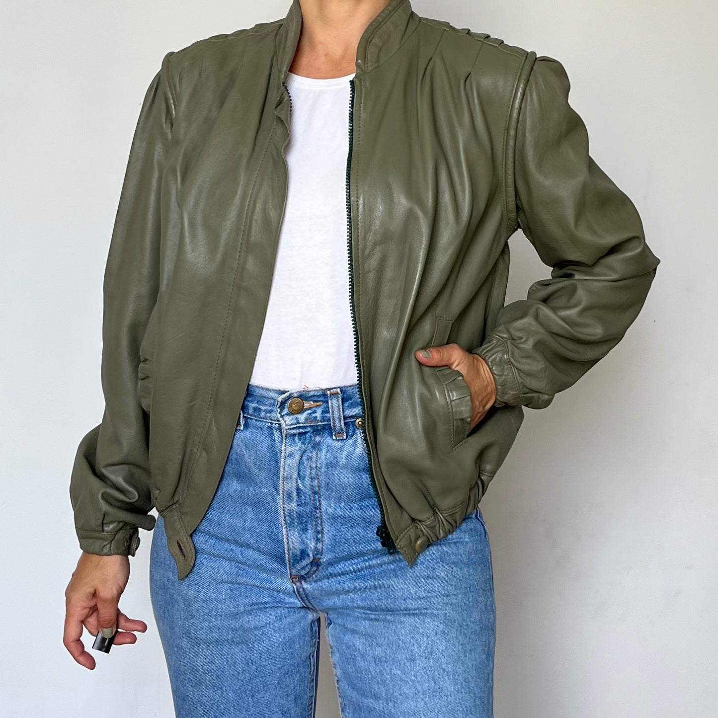 Green leather bomber jacket