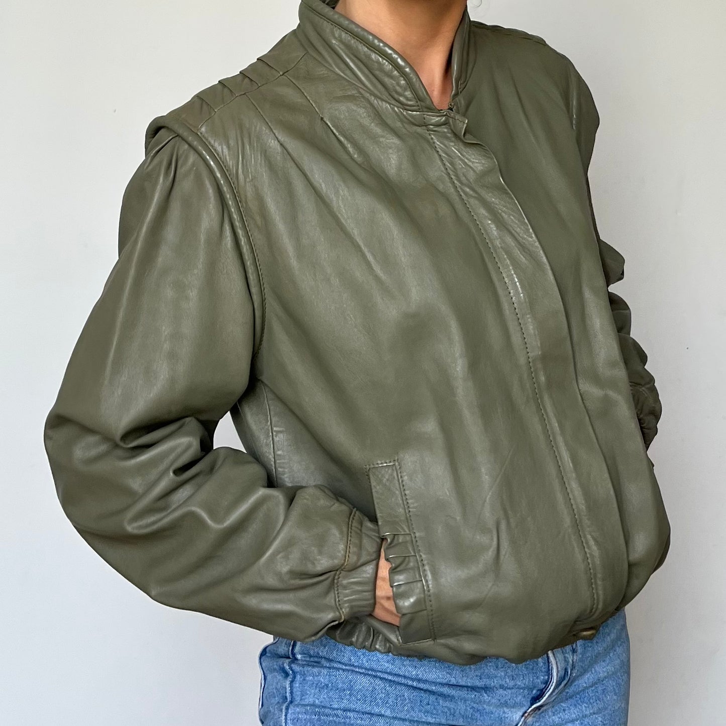 Green leather bomber jacket
