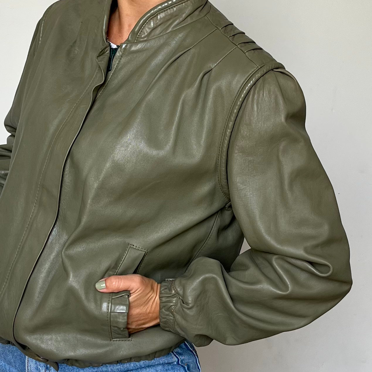 Green leather bomber jacket