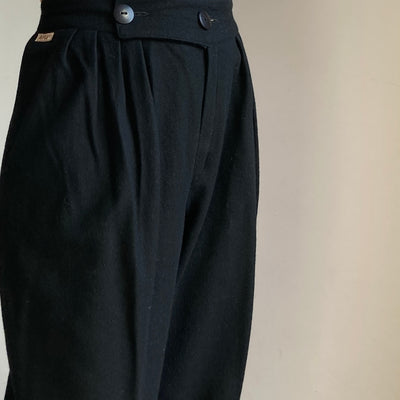 Black wool trousers